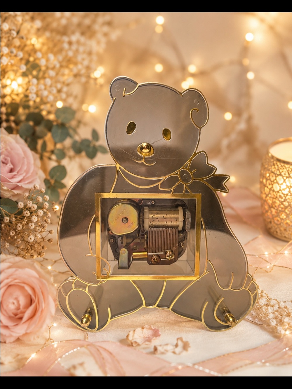 Clear Teddy Bear Music Box Picture Frame with Gold Accents Yes, the music works.
